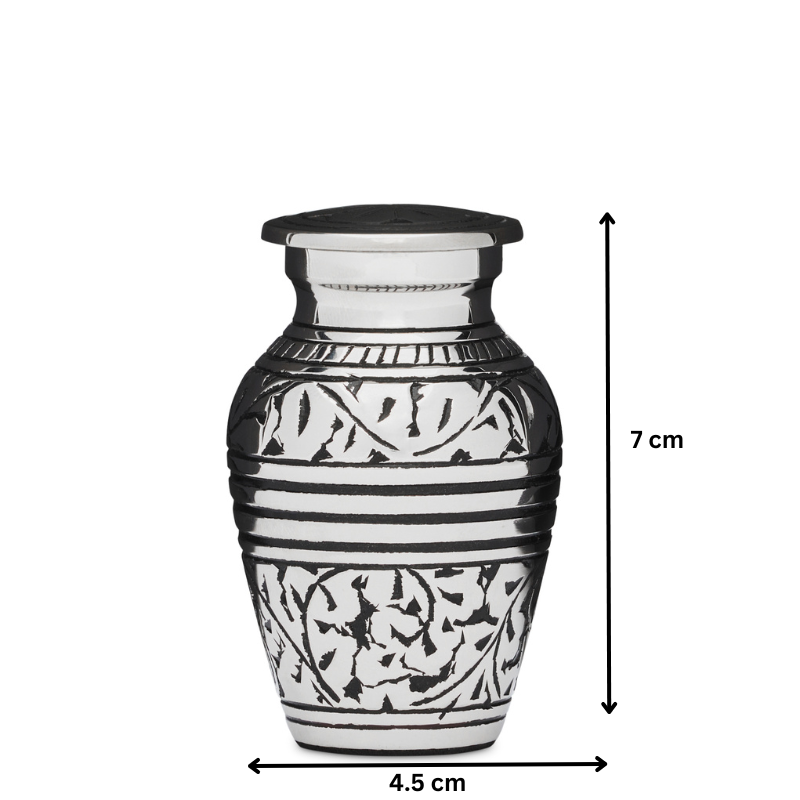 Silver Acorn Keepsake Urn measuring 7 cm tall and 4.5 cm wide, crafted from solid brass with intricate leaf engravings and secure sealing lid.