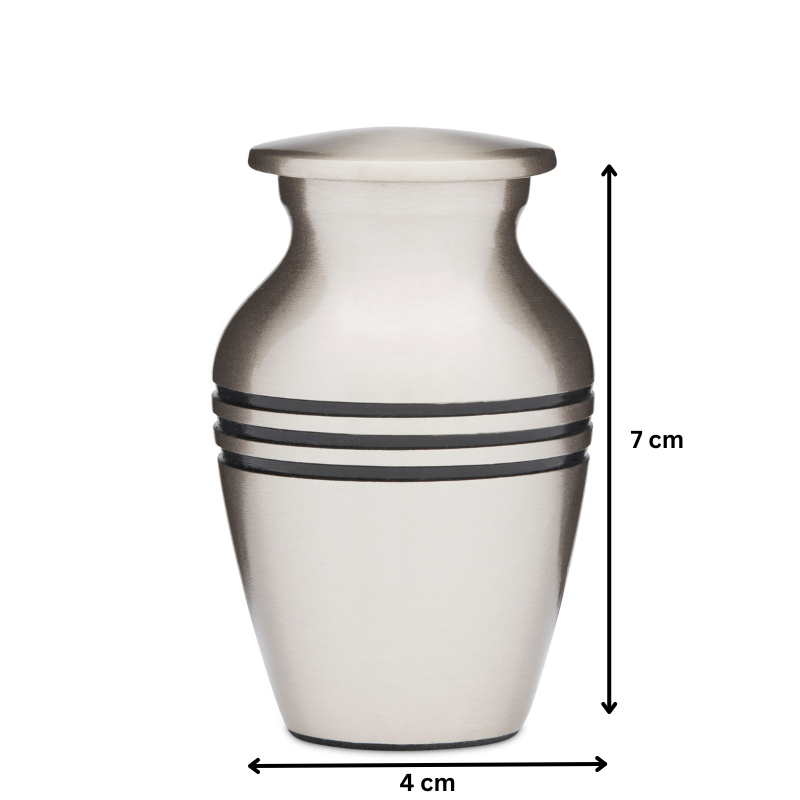 Classic Pewter Keepsake Urn measuring 7 cm tall and 4 cm wide, crafted in solid brass with etched black rings and brushed pewter finish.