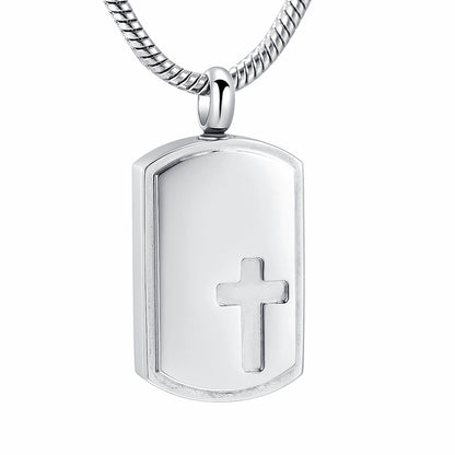 Engraved Cross Pendant - Jewelry | Stainless Steel, Silver. Features a polished silver finish with a recessed cross design on a snake chain.