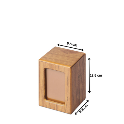 Small timber veneer photo urn with dimensions 12.8 cm height, 9.5 cm width, and 9.3 cm depth. Designed to hold a portion of ashes and display a photo.