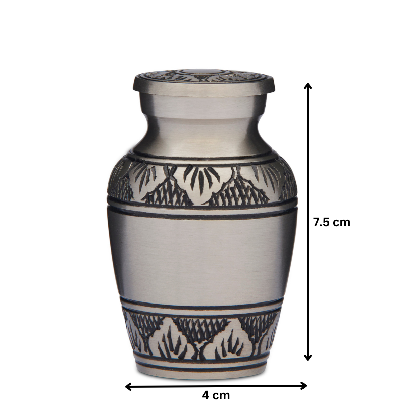 Athena Keepsake Brass Urn measuring 7.5 cm tall and 4 cm wide. Pewter finish with engraved leaf pattern, perfect for storing ashes or keepsakes.
