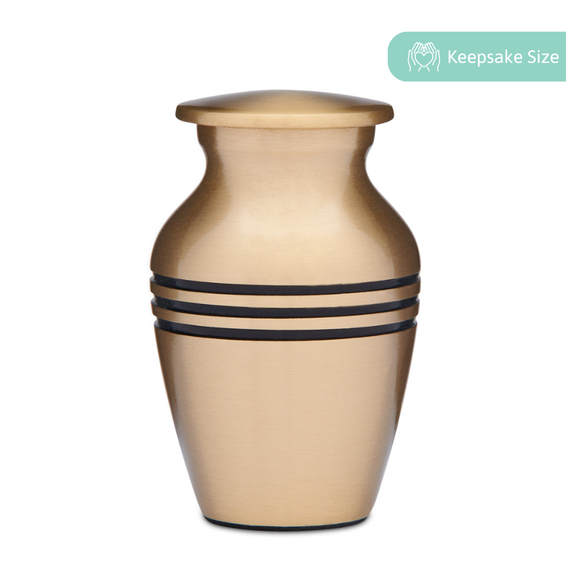 Classic Brass Keepsake Cremation Urn with matte finish and black accent bands, ideal for ashes or mementos. Includes a secure threaded lid.
