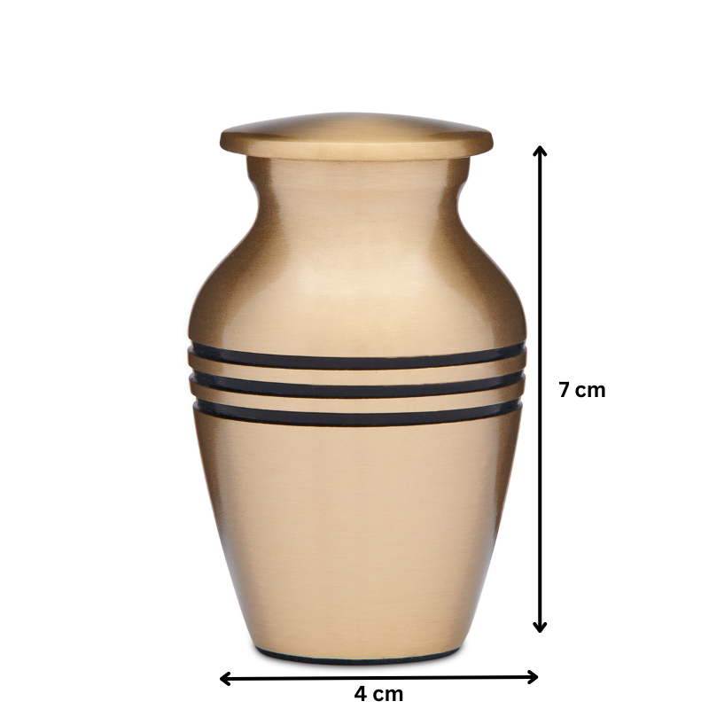 Classic Brass Keepsake - Brass Keepsake Cremation Urn measuring 7 cm tall and 4 cm wide, perfect for storing small portions of ashes.