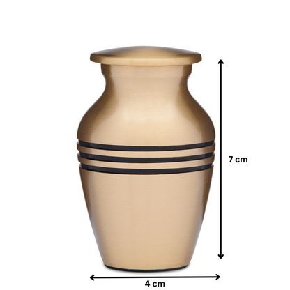 Classic Brass Keepsake - Brass Keepsake Cremation Urn measuring 7 cm tall and 4 cm wide, perfect for storing small portions of ashes.