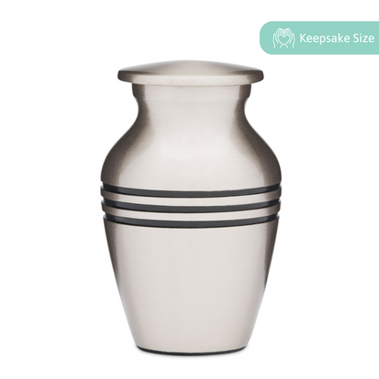 Pewter Keepsake Urn - Classic Keepsake in solid brass with brushed finish and etched black rings, ideal for ashes or mementos.