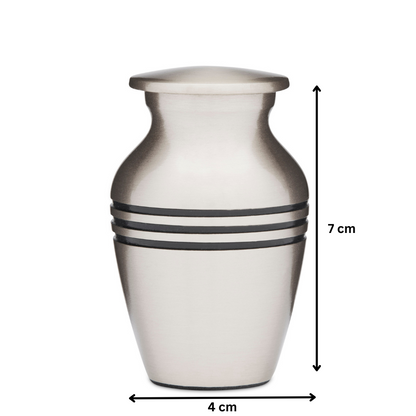Classic Pewter Keepsake Urn measuring 7 cm tall and 4 cm wide, crafted in solid brass with etched black rings and brushed pewter finish.