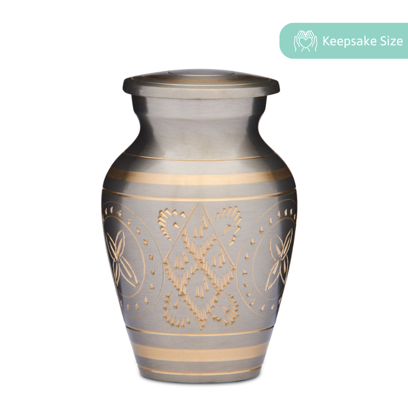Gold Keepsake Urn - Brass Urn for Ashes with engraved floral and geometric patterns. Compact and elegant design for memorial mementos.