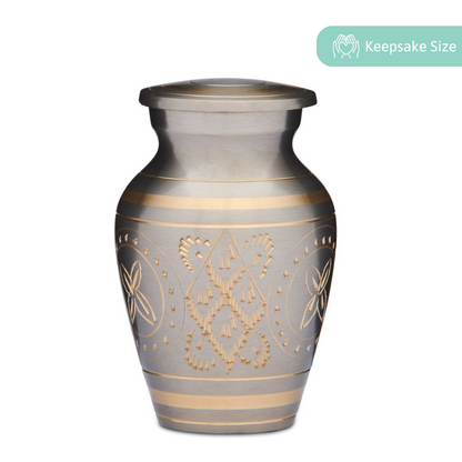 Gold Keepsake Urn - Brass Urn for Ashes with engraved floral and geometric patterns. Compact and elegant design for memorial mementos.