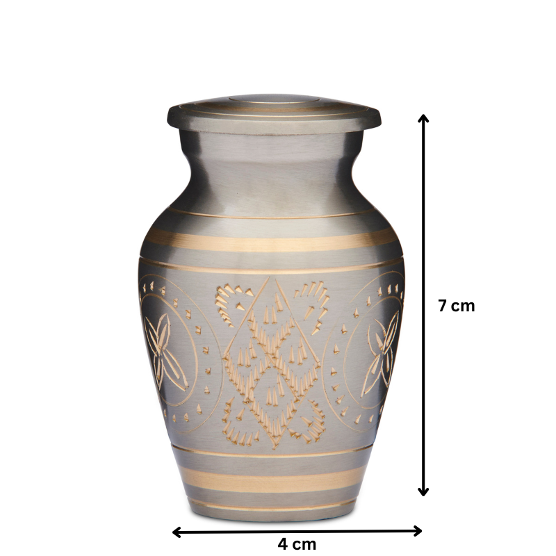 Gold Keepsake Urn - Brass Urn for Ashes measuring 7 cm tall and 4 cm wide. Features intricate gold detailing and a secure threaded lid.