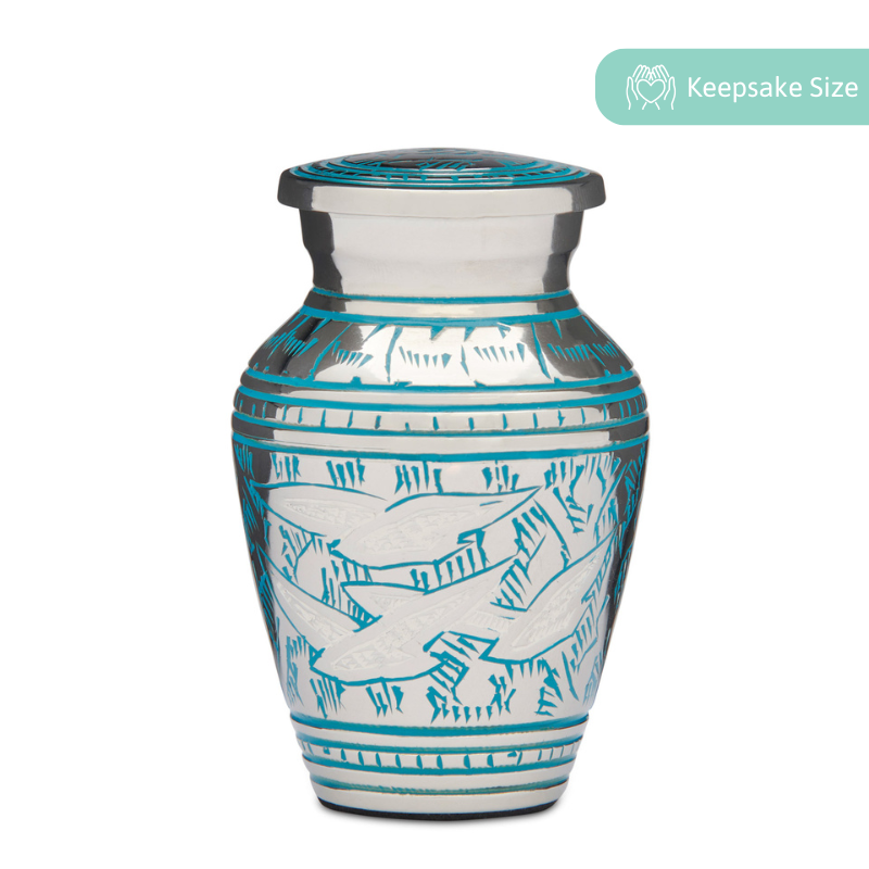 Bird Keepsake Urn - Birds Returning Home in solid brass with teal engravings and a felted base, ideal for small memorials or ashes.