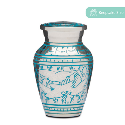Bird Keepsake Urn - Birds Returning Home in solid brass with teal engravings and a felted base, ideal for small memorials or ashes.
