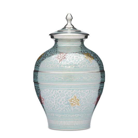 Decorative ceramic jar with lid featuring intricate floral patterns in teal, red, and yellow. Ideal for home decor or storage use.