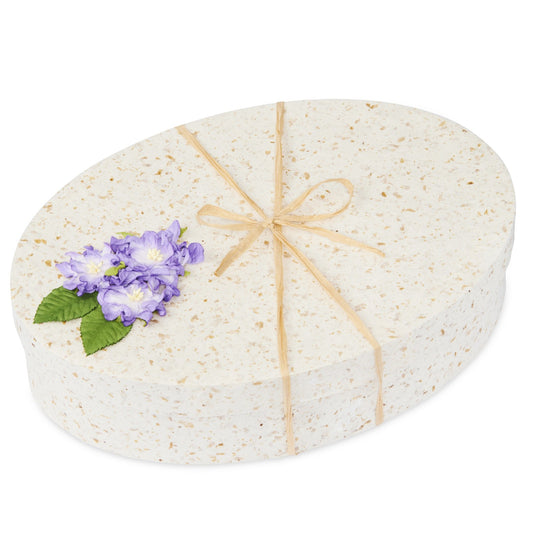 Ocean Urn - Cornflower Ocean Urn features an oval biodegradable design with delicate cornflower accents, ideal for elegant memorial ceremonies.