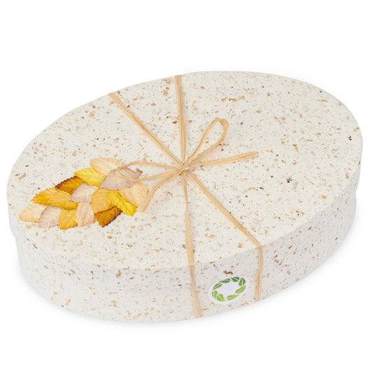 Ocean Urn Autumn Leaves by Life Cycle Urns features a biodegradable oval design with pressed autumn leaves, ideal for eco-friendly memorials.