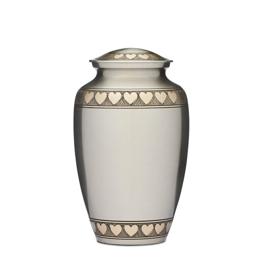 Golden Hearts cremation urn from the Golden Hearts - Jewelry Collection | Stylish Accessories. Features gold heart accents on brushed silver finish.