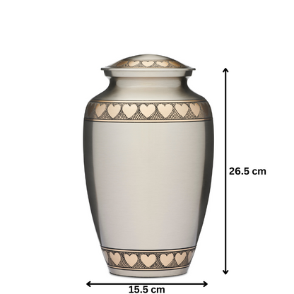 Golden Hearts urn with gold heart detailing, 26.5 cm tall and 15.5 cm wide. Part of the Golden Hearts - Jewelry Collection | Stylish Accessories.