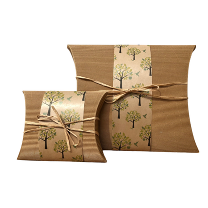 Biodegradable Apple Tree Urn - Secure Ashes | Eco-Friendly, small and large pillow box urns wrapped in tree-themed kraft paper with twine.