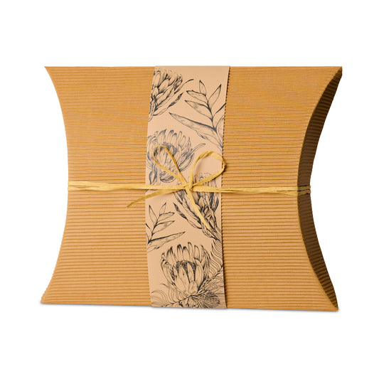 Bio Burial Urn Natives Large in eco-friendly kraft box with floral native print wrap and raffia tie, ideal for sustainable memorials