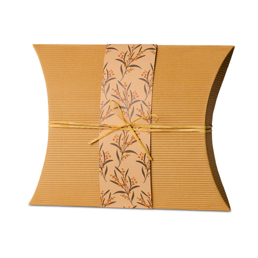 Burial Urn Wattle - Large biodegradable urn made from recycled cardboard with floral wrap and twine, ideal for eco-friendly soil burial.