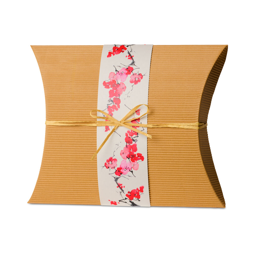 Biodegradable burial urn - adult size made from recycled cardboard with cherry blossom wrap and raffia tie, ideal for eco-friendly cremation.