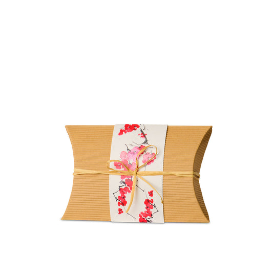 Bio Burial Urn Blossom Small made of eco-friendly cardboard with floral wrap and twine, ideal for ground cremation burial.