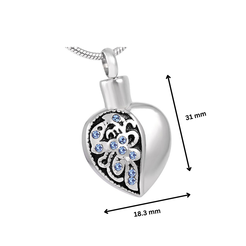 Bluestone Heart pendant with dimensions 31mm x 18.3mm, featuring stainless steel build and blue crystal floral detailing.