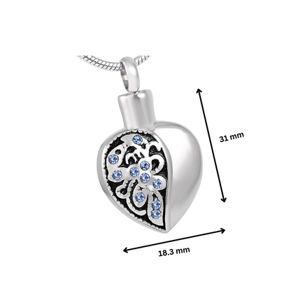 Bluestone Heart pendant with dimensions 31mm x 18.3mm, featuring stainless steel build and blue crystal floral detailing.