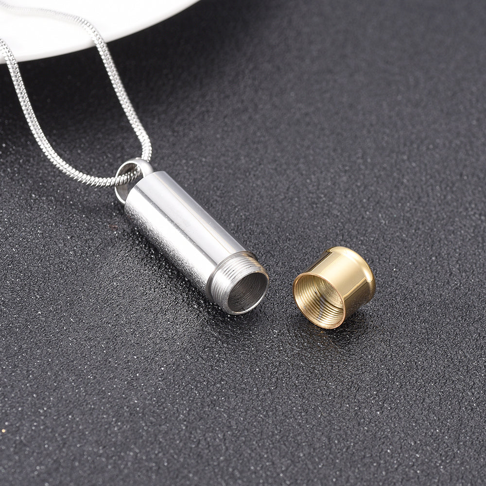 Stainless steel Two Tone Cylinder Pendant shown open to reveal inner compartment, perfect for ashes or keepsake storage.