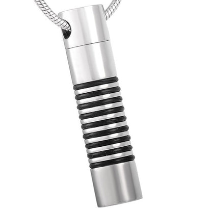 Stripe Cylinder Pendant - Modern Pendant Lighting in stainless steel with black stripe accents, designed to hold ashes as a memorial keepsake.
