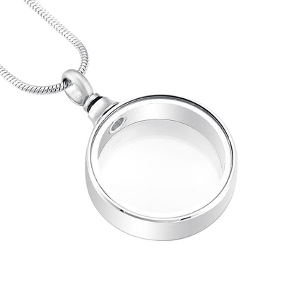 Looking Glass Pendant - Glass Pendant Necklace | Stainless Steel with clear round glass front and polished silver-tone frame on a snake chain.