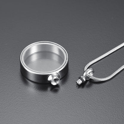 Looking Glass Pendant - Glass Pendant Necklace | Stainless Steel shown open with threaded screw cap, ideal for storing small keepsakes or mementos.