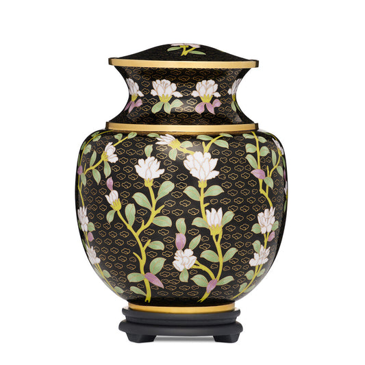 Midnight Bloom Adult Urn - Elegant Memorial Keepsake featuring a black brass body with white floral patterns and gold accents. Includes a secure lid and display stand.