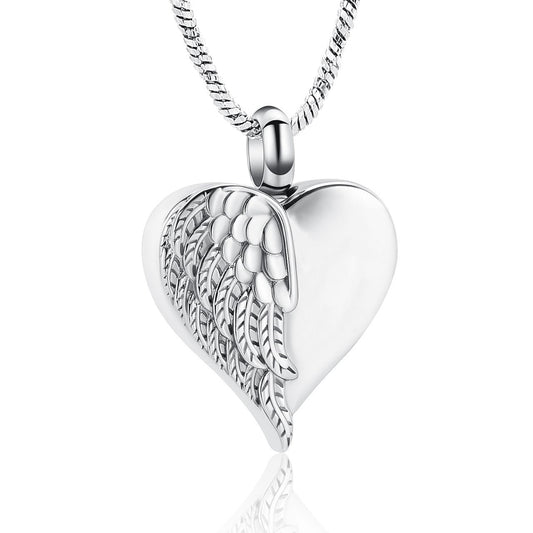 Angel Heart Pendant in silver tone with detailed angel wing design on heart-shaped stainless steel. Ideal for ashes keepsake or memorial jewelry.