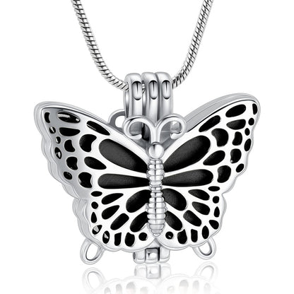 Butterfly Urn Pendant Black - Stainless Steel Necklace with intricate cutout wings and black enamel center, ideal for memorial keepsakes.