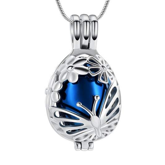 Butterfly Egg Urn Pendant Blue in stainless steel with floral and butterfly design. Memorial ash keepsake jewelry with polished blue center.