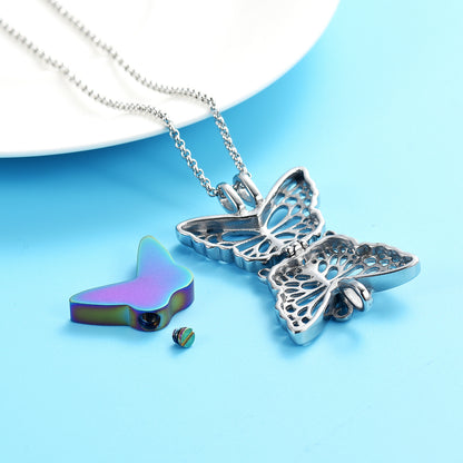 Disassembled Butterfly Urn Pendant Rainbow showing internal ash compartment and screw cap, crafted from stainless steel with rainbow insert.