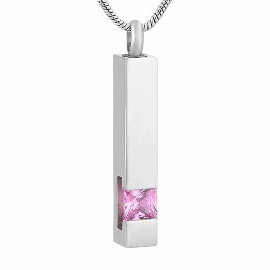 Column Pendant with Pink Stone in stainless steel, designed as a cremation jewelry keepsake. Features a sleek rectangular shape and velvet bag included.