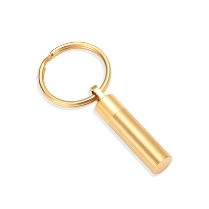 Gold Cylinder Keychain with sleek stainless steel design and polished gold tone finish. Ideal for ashes or small keepsakes.