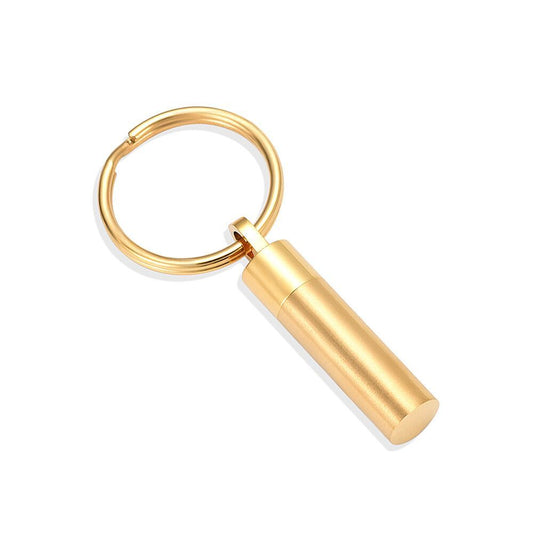 Gold Cylinder Keychain with sleek stainless steel design and polished gold tone finish. Ideal for ashes or small keepsakes.
