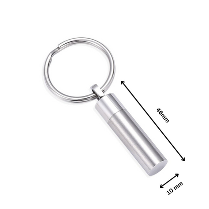 Stainless steel silver tone cylinder keychain with dimensions 46mm x 10mm. Compact memorial keepsake for ashes with secure closure.