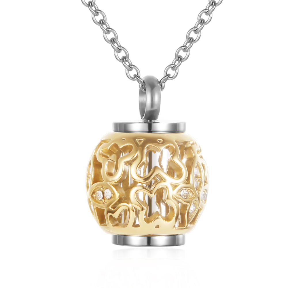 Gold Tone Lantern Urn Pendant featuring intricate butterfly design and silver trim, crafted in stainless steel for memorial keepsake purposes.