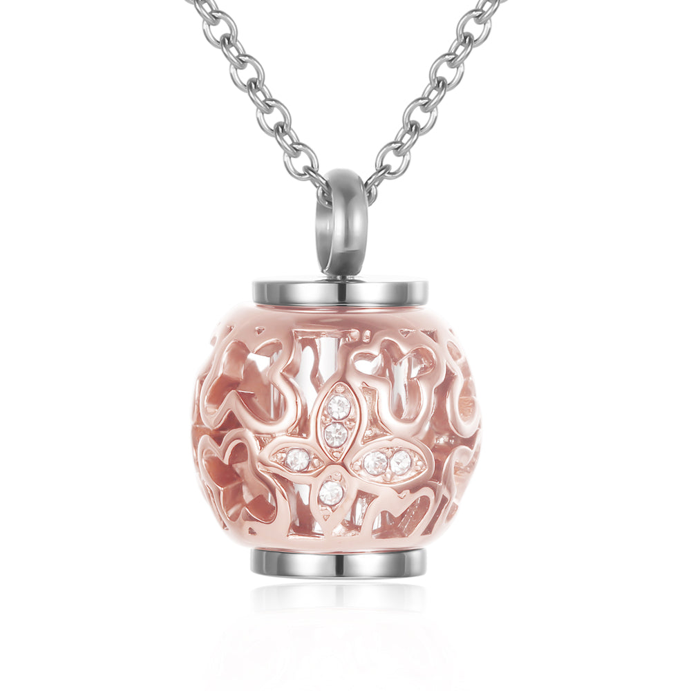Lantern urn rose gold pendant with butterfly design and crystal accents, ideal memorial keepsake in durable stainless steel with satin cord.