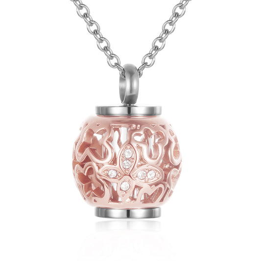 Lantern urn rose gold pendant with butterfly design and crystal accents, ideal memorial keepsake in durable stainless steel with satin cord.