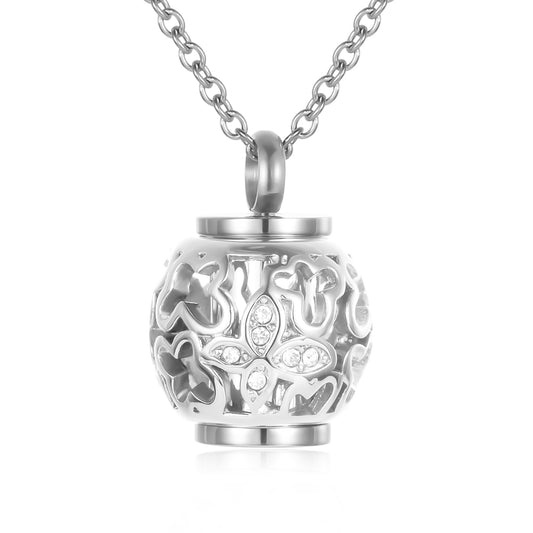 Lantern urn pendant silver tone with butterfly design and crystal accents, includes inner urn for ashes and stainless steel chain.