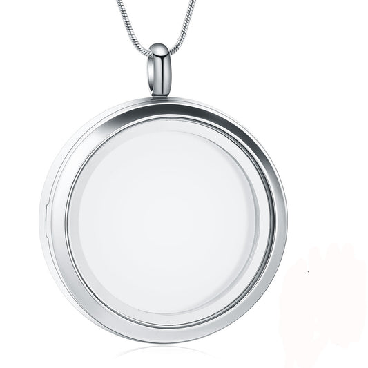 Stainless steel photo locket pendant with clear glass front and magnetic clasp, ideal for storing ashes or small keepsakes. Includes chain for wearing.