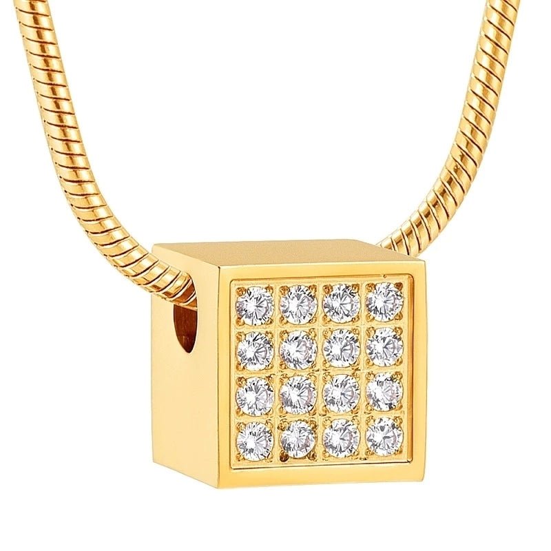Square Diamante Pendant - Gold Pendant Necklace featuring a cube-shaped charm with 16 clear diamantes on a gold-tone stainless steel chain.