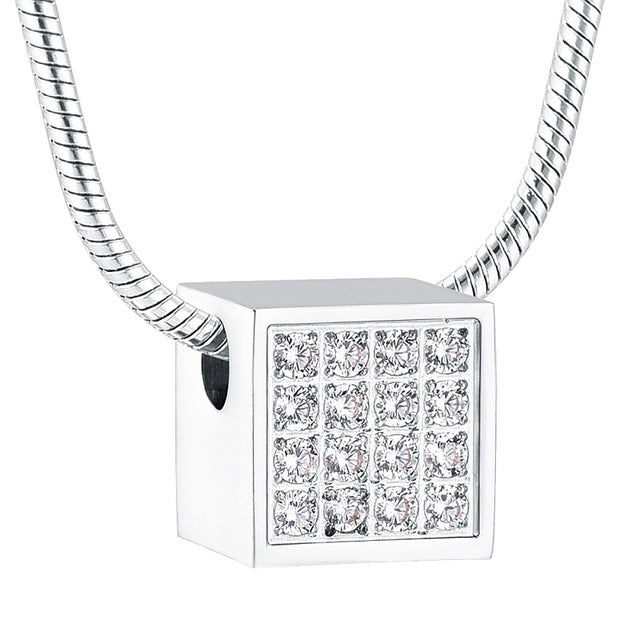 Square Diamante Silver Pendant with 16 white crystals on a stainless steel necklace. Modern cube design ideal for fashion jewelry collections.