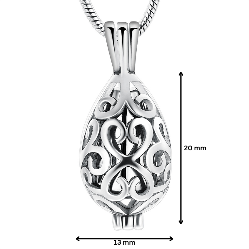 Stainless steel teardrop urn pendant with scrollwork, measuring 20mm by 13mm. Elegant silver memorial necklace for ashes or keepsake storage.
