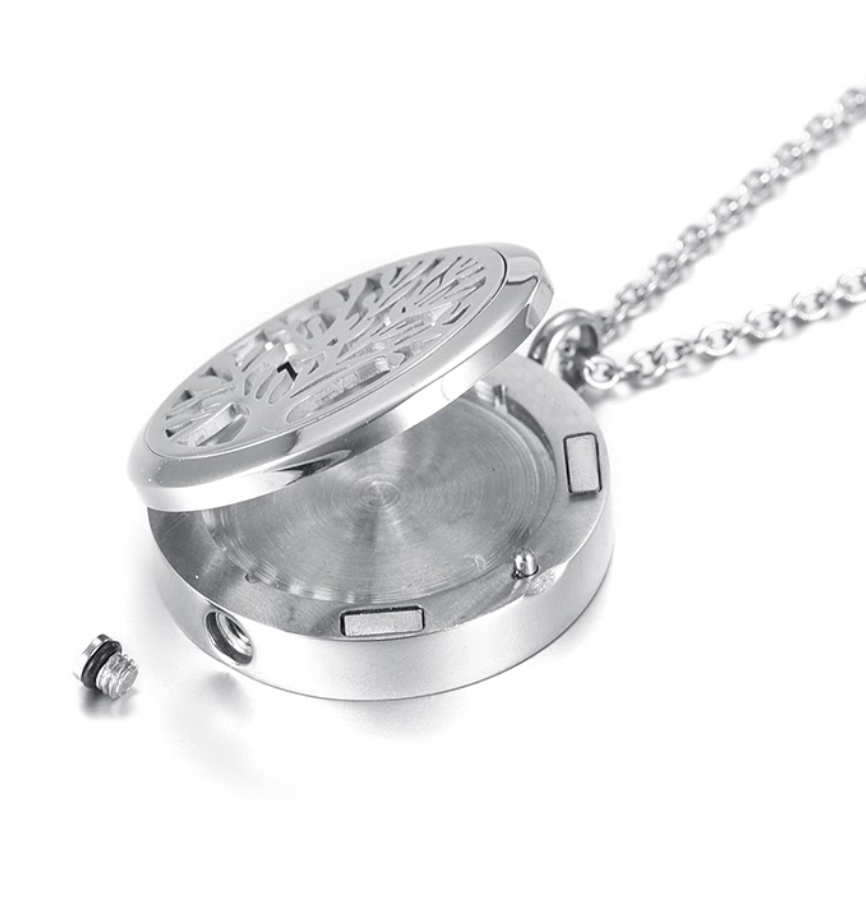 Open Round Tree of Life Pendant - Memory Locket | Ash Storage showing inner compartment for ashes or photo, with secure screw closure.