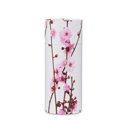 Large Cherry Blossom Urn for memorials with secure closing, featuring pink floral design on a white cylindrical container.